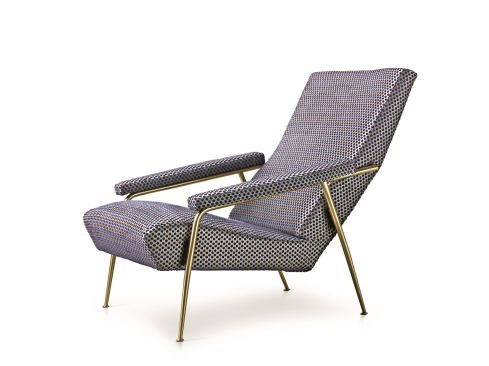 Molteni&C is re-releasing an armchair that Gio Ponti designed for his via Dezza home in Milan. It's upholstered in Ponti-designed, velvet pointillist fabric called Punteggiato. Ponti designed the fabric for Rubelli, and it was originally displayed at the 1934 Venice Biennale.