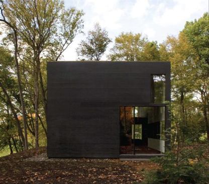 With its abstracted building forms and deftly controlled surfaces matte on the outside, highly polished within this single-purpose building delivers multiple layers of surprise. 