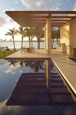 The outdoor kitchen provides dramatic views to the Miami skyline.