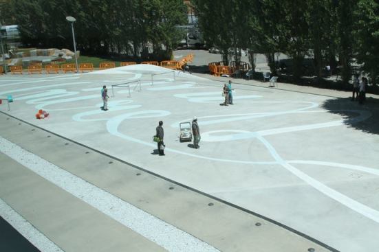 This year's YAP_MAXXI installation, by Urban Movement Design, start with swirling script painted on the piazza next the the Zaha Hadid-designed museum.