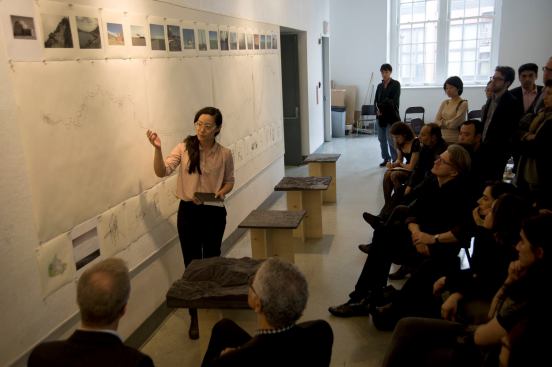 A student presents her thesis project to the jury during the final weeks of the spring semester.