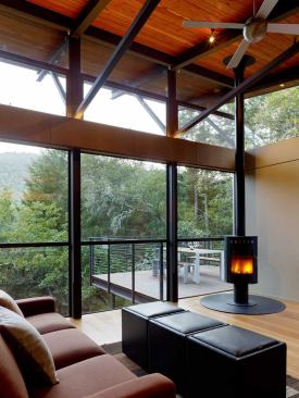 The guest house’s elevation above grade creates a treehouse effect.