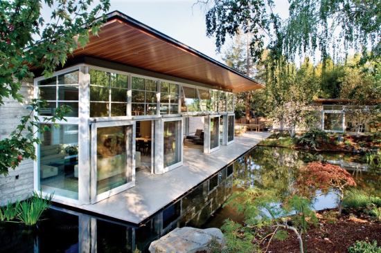 Lush plantings by landscape architect Lutsko Associates lend privacy to the property.