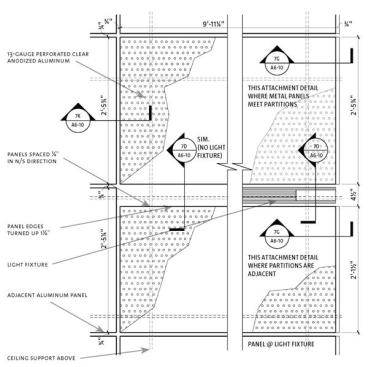 Metal ceiling panels thematically relate to the building envelope and contrast with warm wood floors and walls in key locations.