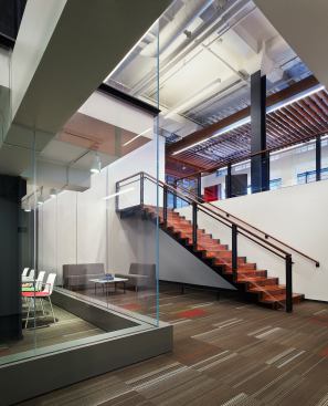 The lower-level is accessed by a stair off of the ground-level lobby.