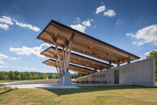 The Committal Shelter overlooks a landscaped wetlands.