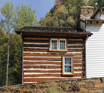 A close-up of the 1794 cabin, where the logs were carefully preserved and re-chinked.