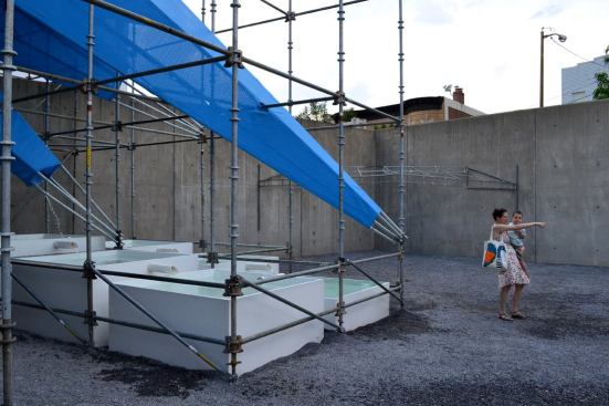 "It’s gorgeous. It’s so much fun. We live nearby, so it’s been exciting to see it get built. My sons, who are three, wake up from their nap in the afternoon and beg to come to PS1. It’s something big and constructed in our backyard. They would peek in through the holes in the courtyard wall and see the different things going up—first the scaffolding, then the fans, so it’s great to see it finished." —Gina Neff