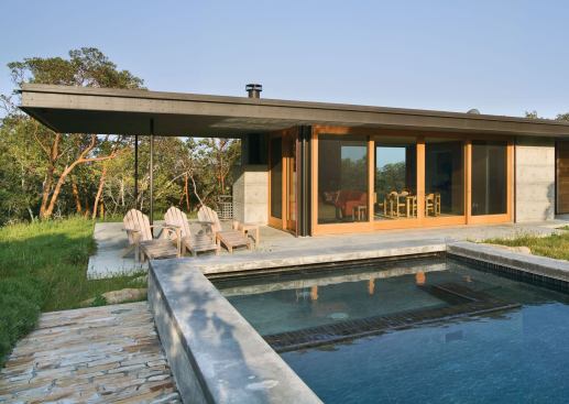 A short uphill hike brings one to the pool pavilion and a shallow lap pool heated entirely with solar collectors.