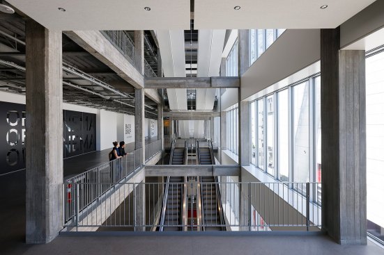 Light-filled circulation spine between the Sphere and the renovated Saban Building