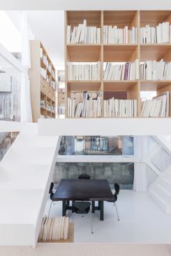 Wood bookcases define the study.
