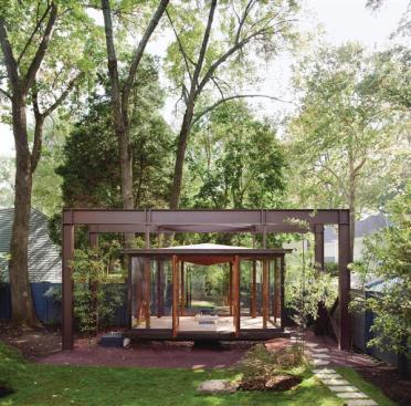 Jameson thinks of the tea house as a ghost structure: you occupy space inside the floating steel frame. 