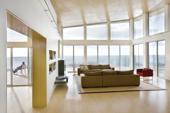 Heat gain from west-facing windows was countered by a tighter, well-insulated building envelope and thoughtfully zoned HVAC.