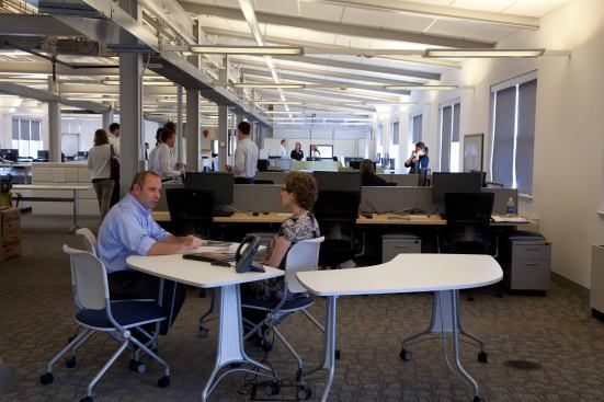 The open workplace is designed for easy collaboration between colleagues.