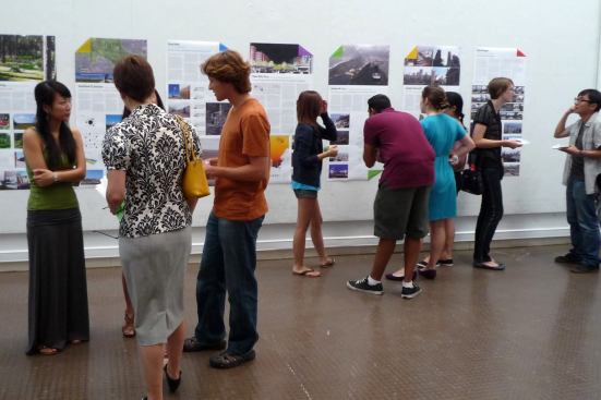 Summer Travel Fellowship exhibition - Sarah Whiting in conversation with students Crystal Lin and Jorge Bouffier.