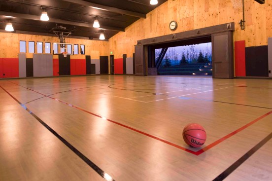 A multipurpose sports court doubles as a community event venue.