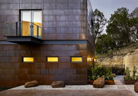 The manufacturer specializes in roofing and wall cladding made from a variety of metals, including copper as shown on this Austin home. You can order products in aluminum, stainless steel, copper, and galvanized metal and in a variety of profiles and colors. www.fabral.com.