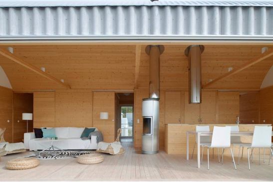 The cottage’s simplicity and openness create a sense of spaciousness that belies its modest size.