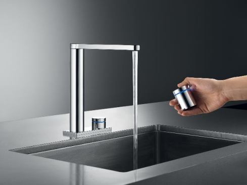The ONO touch light PRO from KWC America features a portable, wireless, touch-operated control that can be positioned virtually anywhere near the kitchen faucet. It allows users to choose one of three preset temperatures. A colored light ring lets users know the temperature that has been selected. 
www.kwcamerica.com.