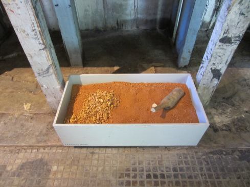 In Francis Kéré's box, the Berlin-based architect placed red soil from his native country of Burkina Faso.