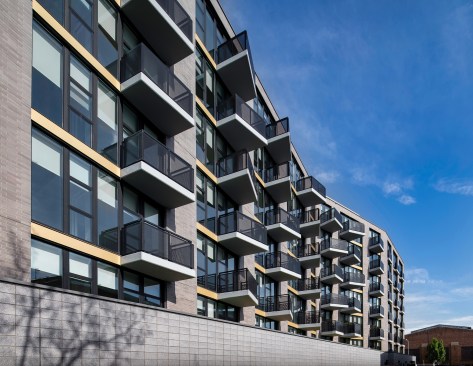 A view of J Linea's asymmetrical balconies positioned alongside the back of the building.