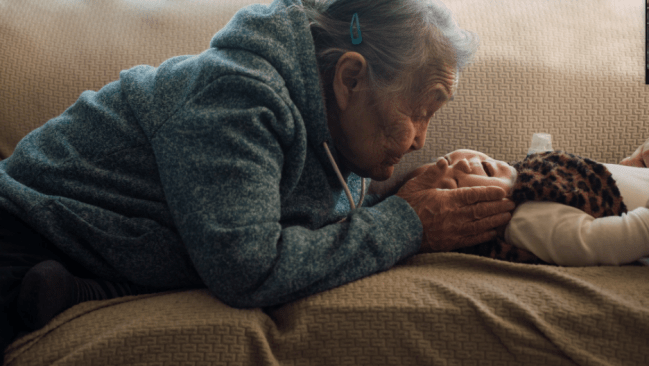 Nellie Nastapoka, 85, in August with her 4-month-old great-great-granddaughter, Annie, in Inukjuak, Quebec.