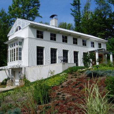Architect: Frank Riepe, Building Arts, Sudbury, MA &nbsp; The owner of this unique New Hampshire home wanted to acknowledge the classical traditions favored by her architect grandfather, but with a distinctly contemporary feel. Reipe looked to early New England architecture, Shaker meeting houses and rural Italian churches for inspiration.