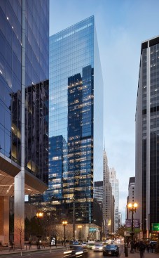 Dusk view of tower from northwest, showing plaza at base