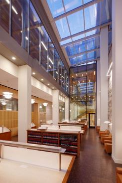 Because the reading room sits below grade and is primarily lit by day with natural light, the designers were mindful of placing fixtures along the perimeter of the space to provide the right balance of natural and electric light.
