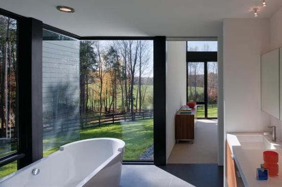 Freestanding tubs often feel out of place in modern architecture, but this one’s ultra-clean lines make it a perfect fit for its home, a contemporary farm house. Project: Becherer House, Charlottesville, Va.; Architect: Robert M. Gurney, Washington, D.C.; Builder: Shelter Associates, Charlottesville