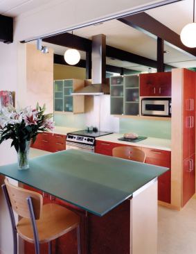 2009 CHDA  Eichler Kitchen Remodel, Palo Alto, Calif.  Custom Kitchen / Merit Award  Anne Phillips Architecture, Berkeley, Calif. Red-stained plywood and other reflective surfaces help distribute natural light throughout this Eichler kitchen remodel designed by Anne Phillips Architecture.