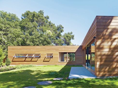 Landscaping by Megumi Aihara surrounds the Low/Rise House.
