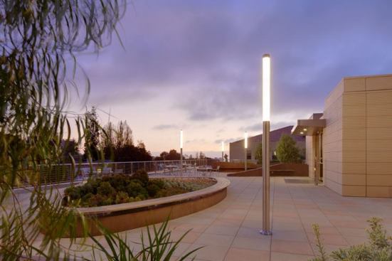 A view of the roof garden. Pedestrian-scale illuminated columns with 32W T8 lamps meet the 1 footcandle minimum for the egress path requirements.