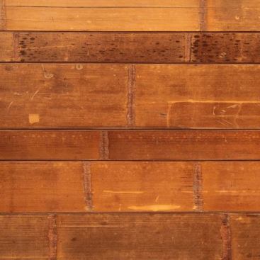 EcoSolid flooring is a new bamboo flooring format that is created by pressing the round bamboo canes flat instead of cutting them into strips for the traditional formats or shredding them for the strand woven formats. The result is a product that is harder than traditional bamboo flooring and has a natural rustic finish. Planks measure 5 inches wide. ecotimber.com.