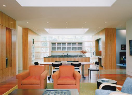 The interiors move directly into the 21st century, however, with large glass expanses and flexible, open spaces.