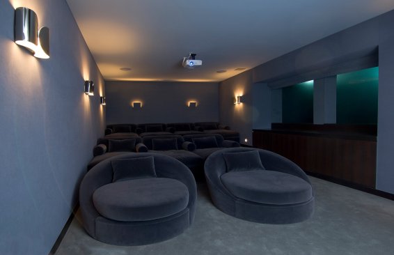 Hopen Place Hollywood Hills modern home theater with underwater pool views