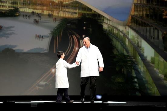 Schuyler St. Leger, a 12-year-old with a passion for inventing, greeted Carl Bass, Autodesk president and CEO, with a handshake and a duel on who had the best LED-illuminated lab coat.