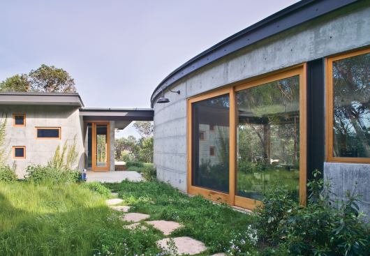 Translucent canopies link the building's three pavilions.
