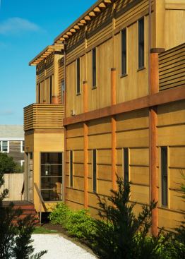 Architect Michael Winstanley isn’t a sailor, but his admiration for the craft of boat-building is reflected in this seaside house. Exterior walls of red cedar, constructed board-and-batten style, recall ship hulls and shack siding. The piers that hold the house up resemble wharf supports.
