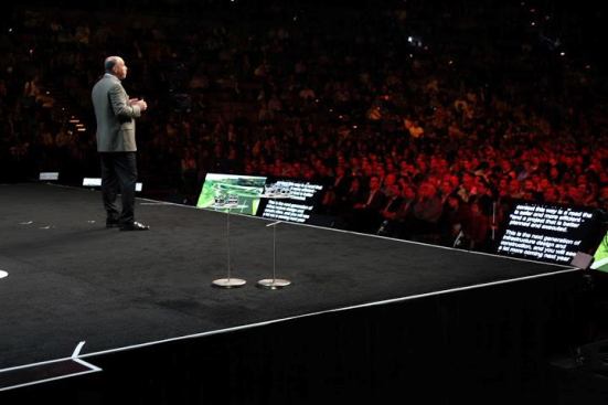 Bass addressing the audience at the opening keynote of Autodesk University 2012