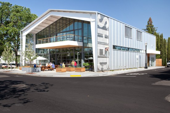 Outdoor+seating+beside+the+entry+provides+a+communal+gathering+spot.