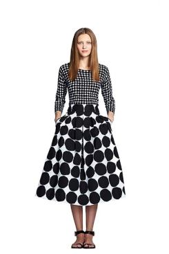 Sweater and skirt in Kivet print.