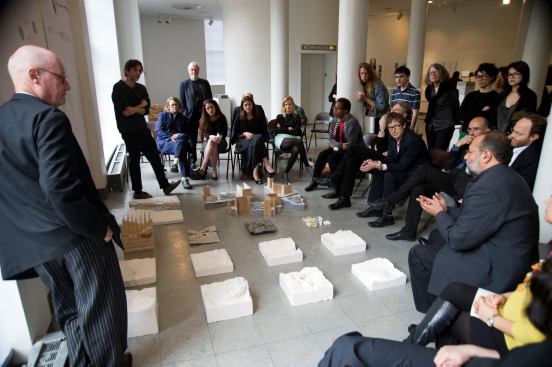 The jury critiques a thesis presentation.