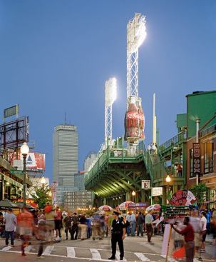 Fenway Park has undergone several transformations and additions over the last few years, with the latest completed in 2011, increasing seating capacity to 37,493. In the background is the Charles Luckman & Associates-designed Prudential Building, criticized harshly in 1964 by the late Ada Louise Huxtable.