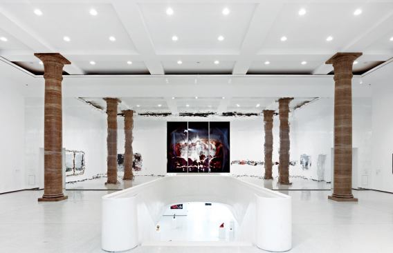 Above ground, a new entry foyer and stair leads down to the new exhibition space.