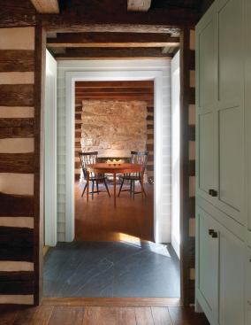 A granite-floored connecting piece links the kitchen to the dining room, which occupies the 1856 addition.