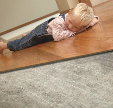 QuietWarmth electric radiant heat underlayment is suitable for use under new floating wood, laminate, and ceramic and porcelain tile flooring. Manufactured by MP Global Products from a minimum 77% recycled textile fibers, QuietWarmth prevents drafts and hot and cold spots, the firm says, and is controlled by individual programmable room thermostats. At 1/8" thick, it does not raise the overall height of the floor beyond that of ordinary underlayment. 
quietwalk.com