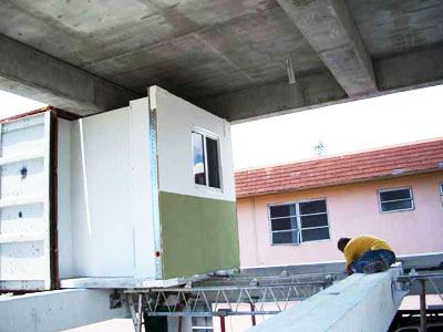 The apartment module slides into the site-built structural grid like a wine bottle. Flexible for any size building, the system can result in 50% faster construction and 30% saving over a site-built structure, the company says.