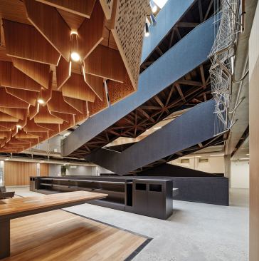 The underside of the switch-back stair is left exposed so that students can understand its steel structure.