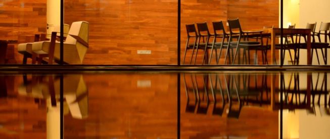 Reflections from one of the House spaces in the adjacent pool.